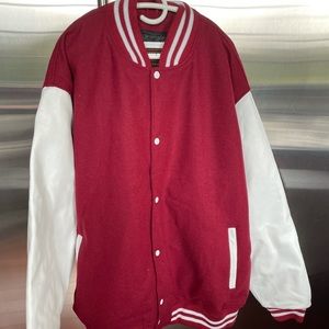 Red and white wool varsity jacket. Leather sleeves. New! No tags. Size 4X.Lined